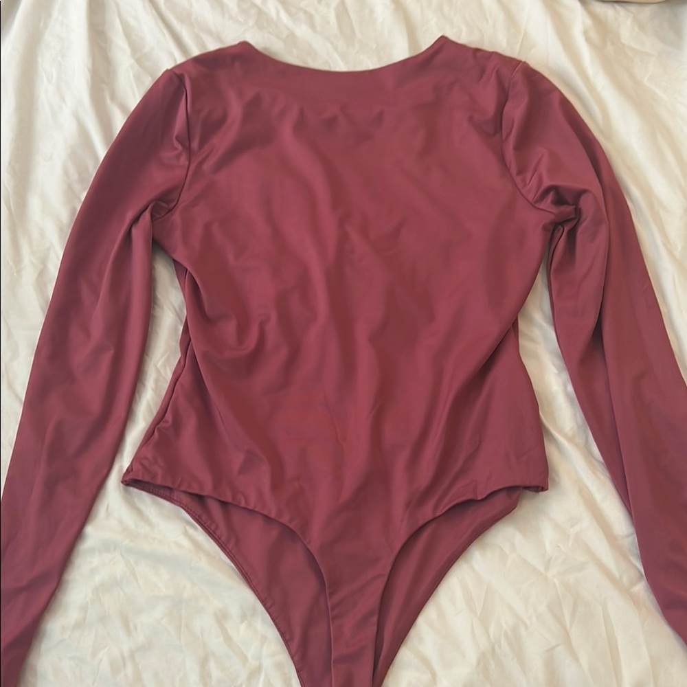 Crave Fame Pink Long Sleeve Bodysuit